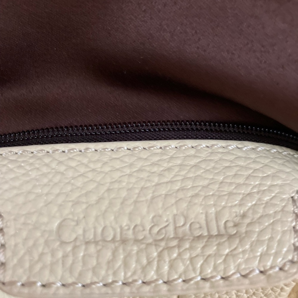 A rich creamy, ivory leather satchel